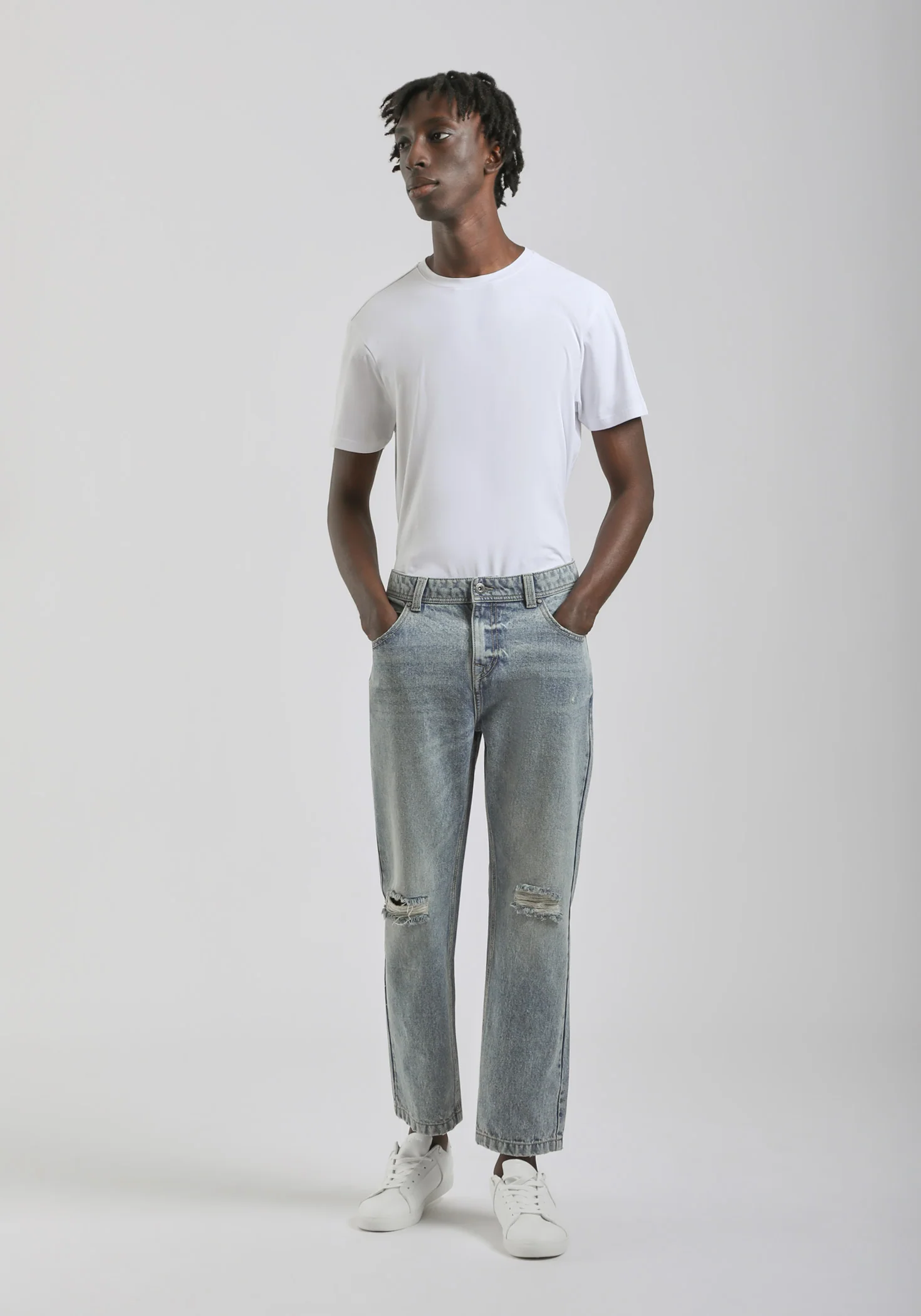 Jeans slim fit con strappi