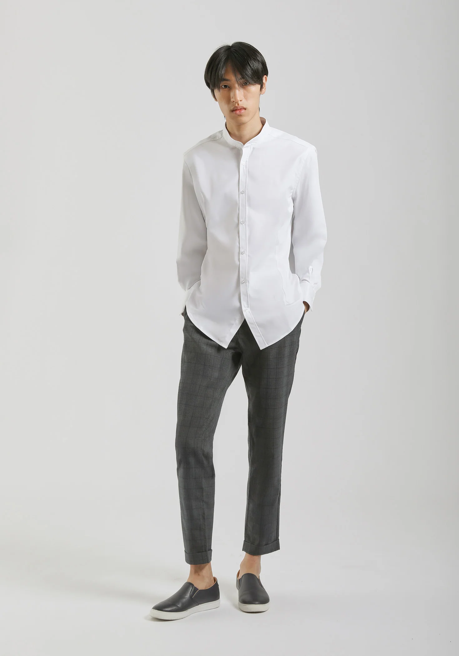 Pantaloni chino con fantasia a quadri